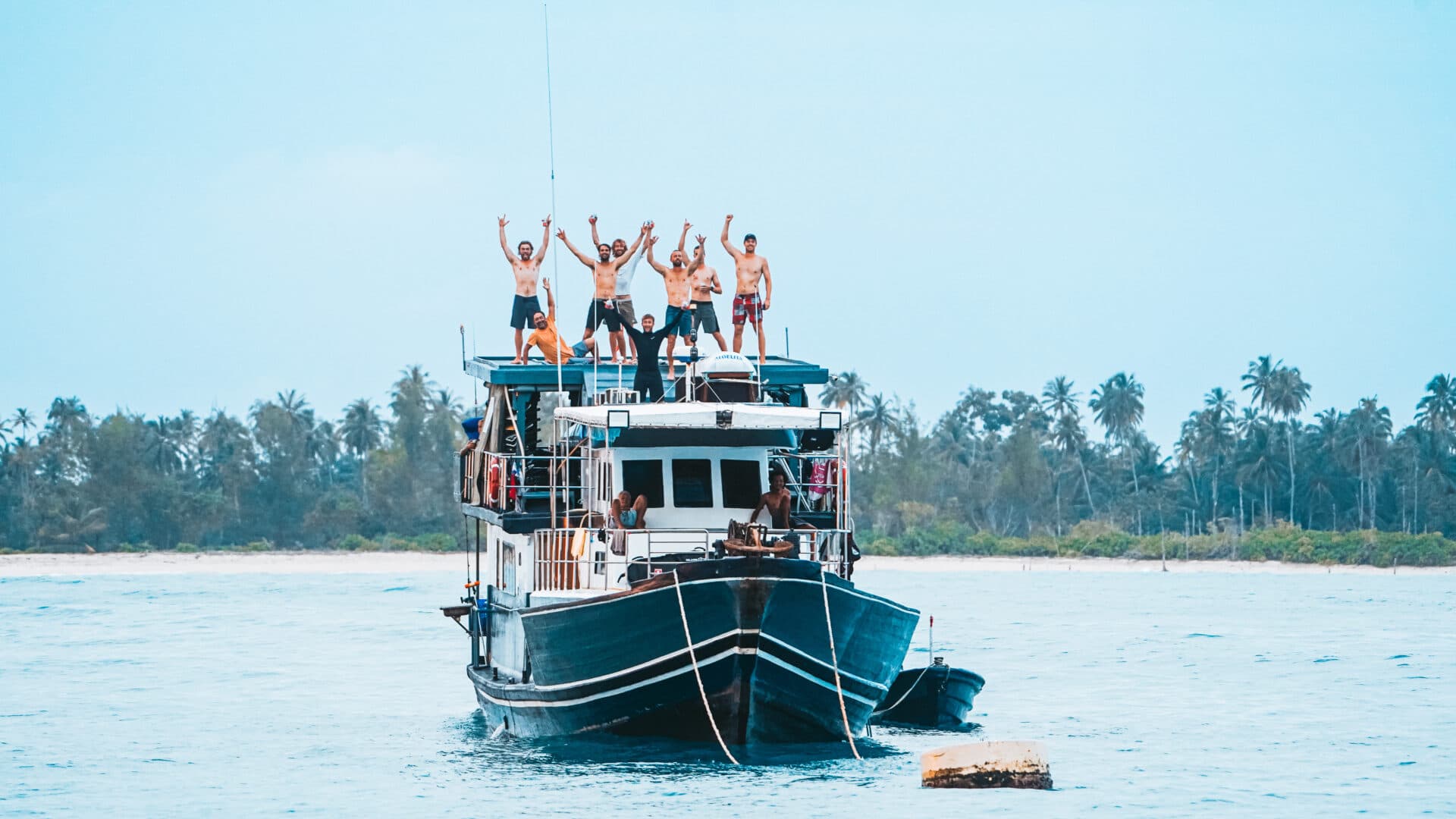 SurfTrips crew aboard a charter boat in the Mentawais